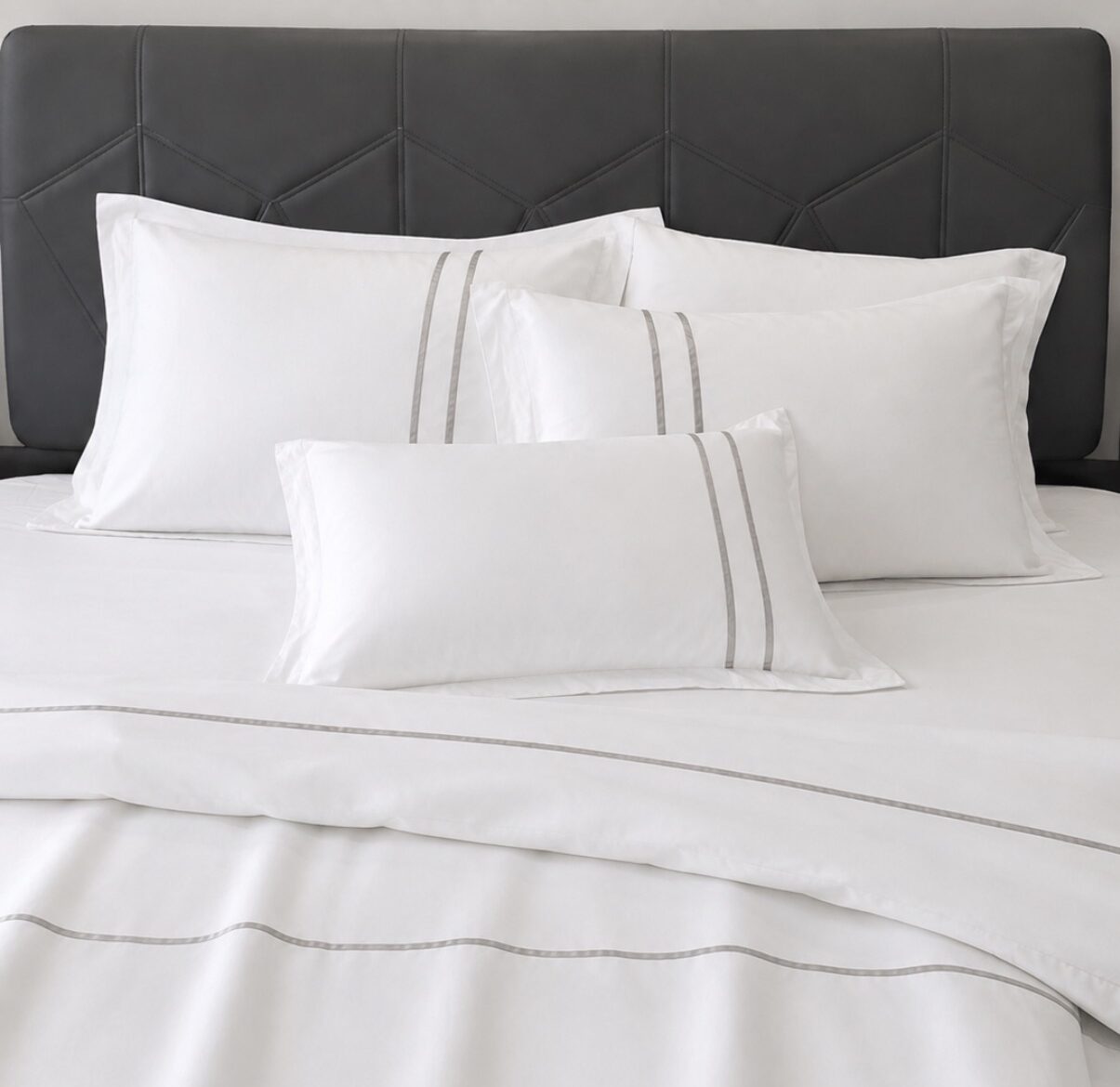 Four white pillowcases included in the 400TC king bedsheet set