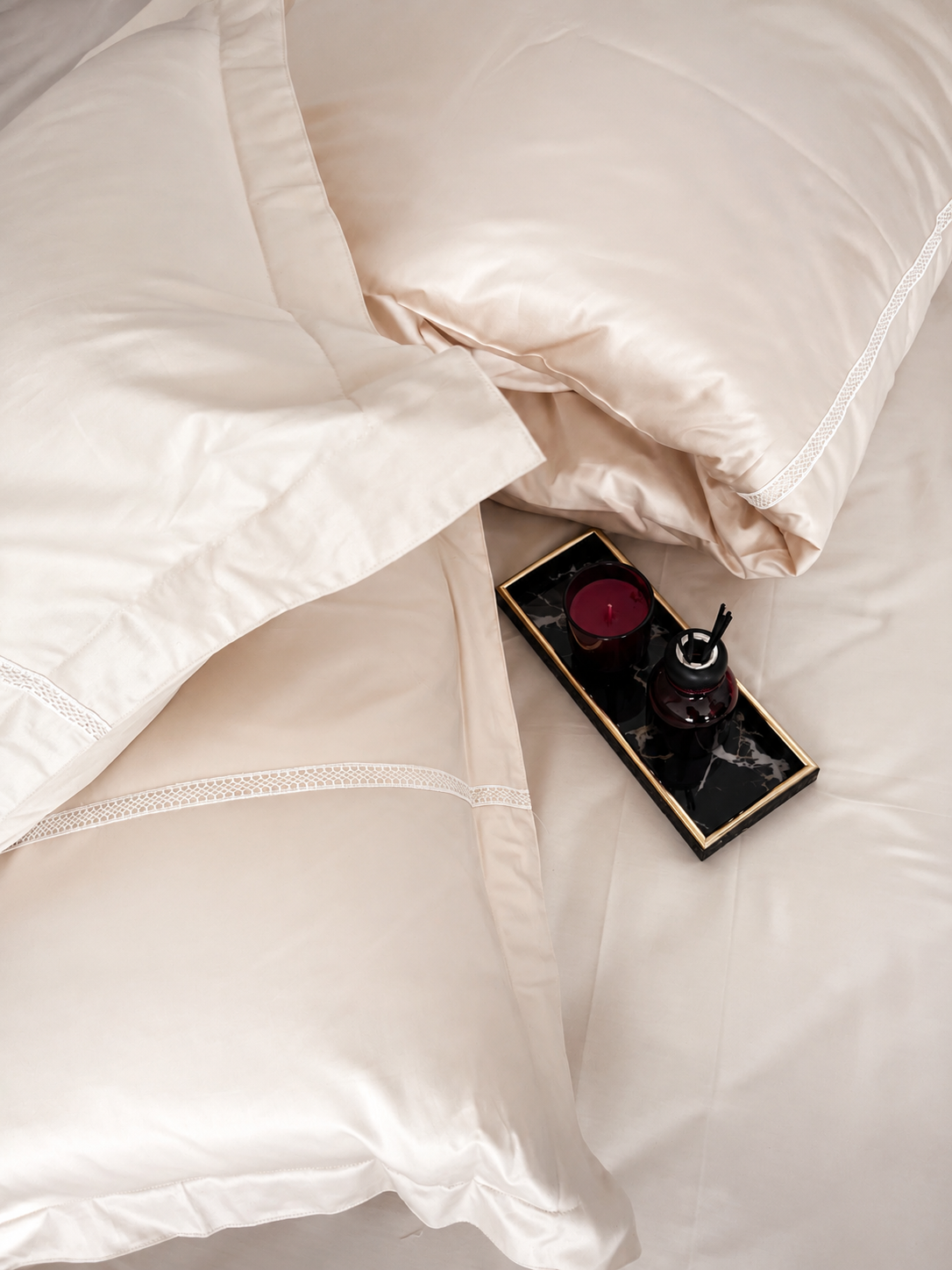 800TC peach queen bedsheet set arranged neatly in a flat lay