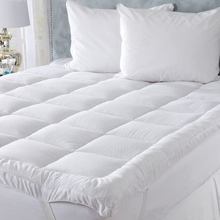 King microfiber bed topper styled in a bedroom